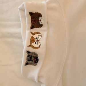 White turtle neck shirt